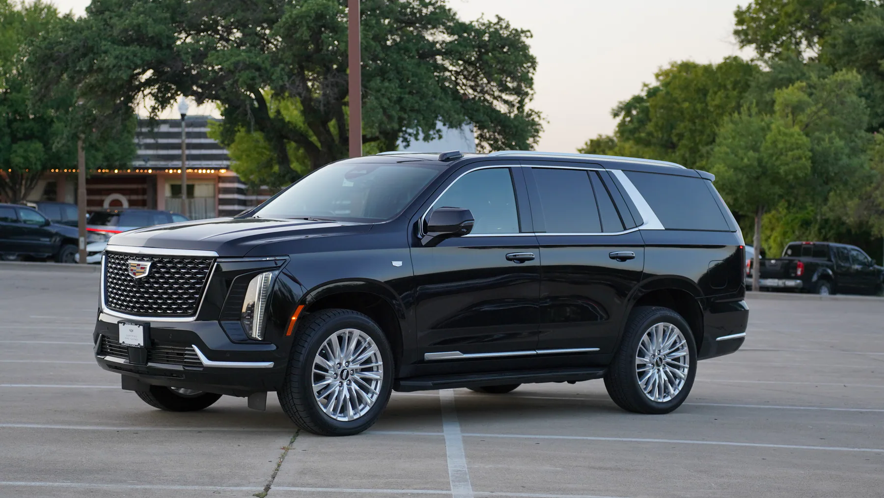 Black 2025 Cadillac Escalade available with chauffeur service in Dallas